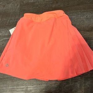 coral LuluLemon skirt